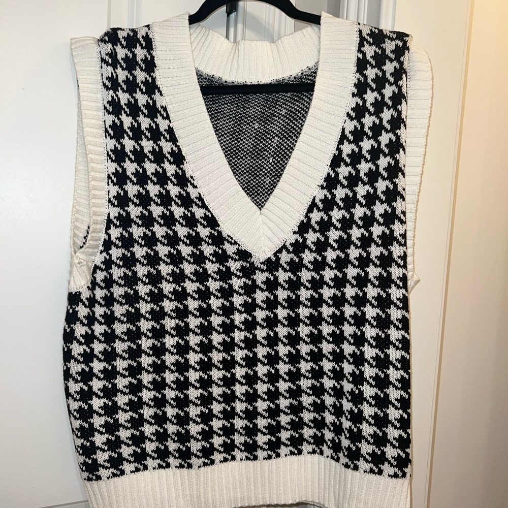 Black and white vest